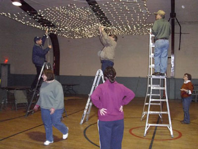 working on ceiling decorations